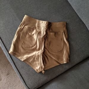American Apparel gold disco shorts